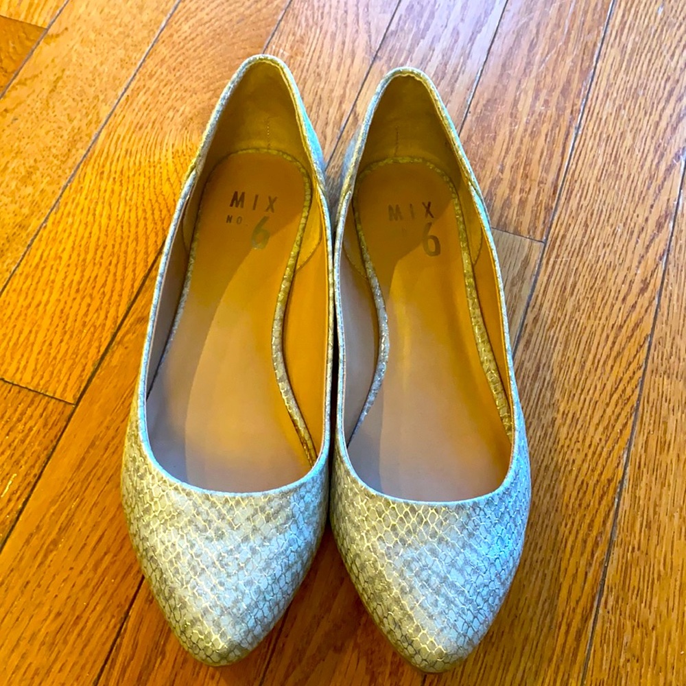 Gray ballet flats.